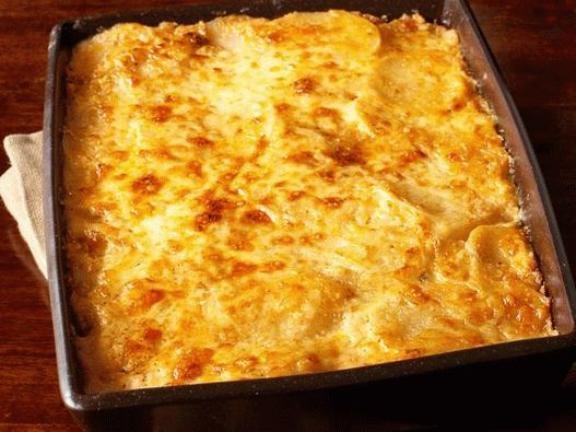 Fotografie z misky - pečené zemiaky so syrom a smotanou
